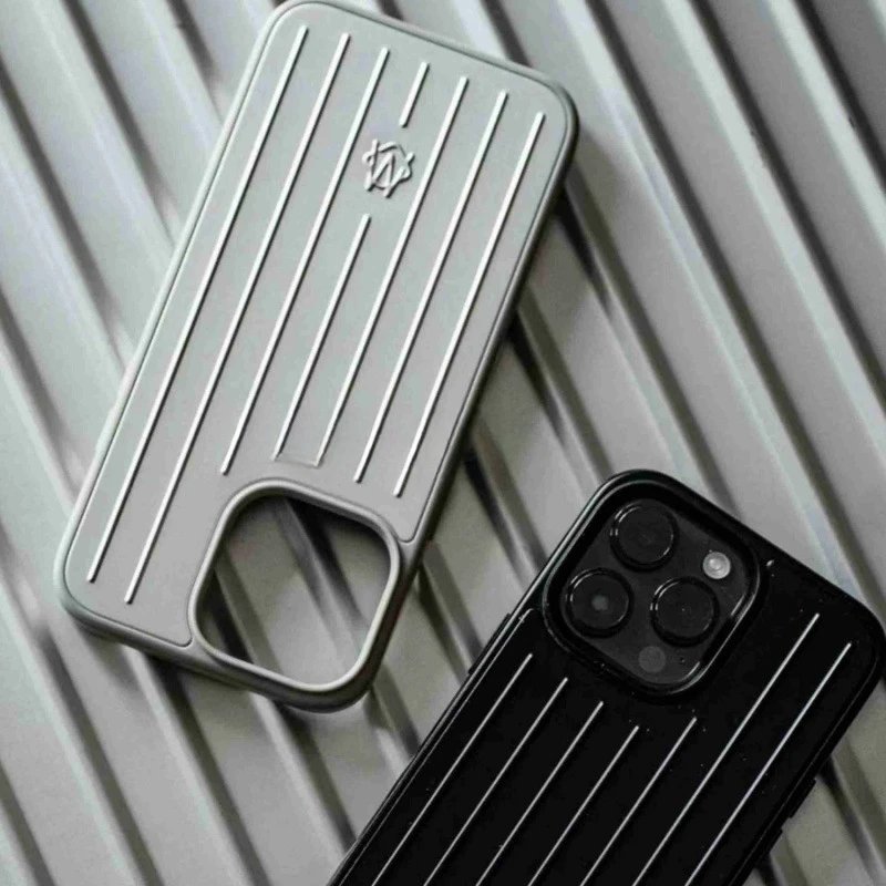 Ribbed phone cases next to a handset