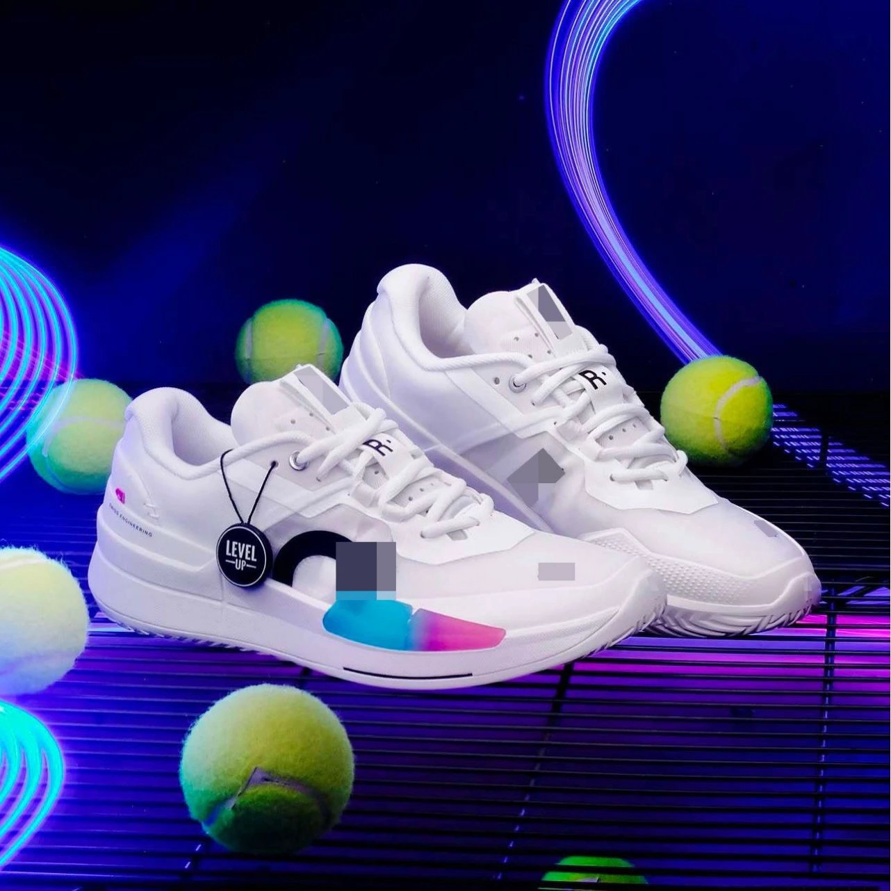 White low-top trainers with coloured accents, boxed